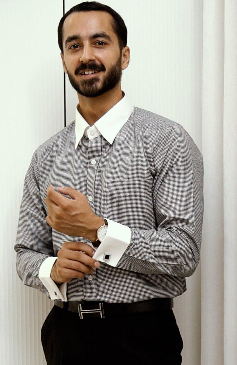 Rishi Arora wearing the Dignity Black Check Shirt