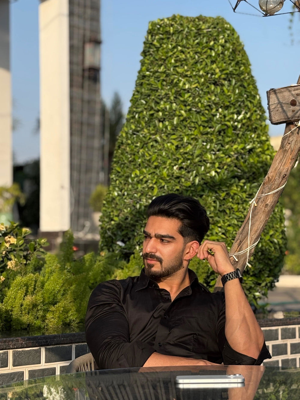 Aabid Tantray wearing the Dignity Black Cotton Satin Shirt