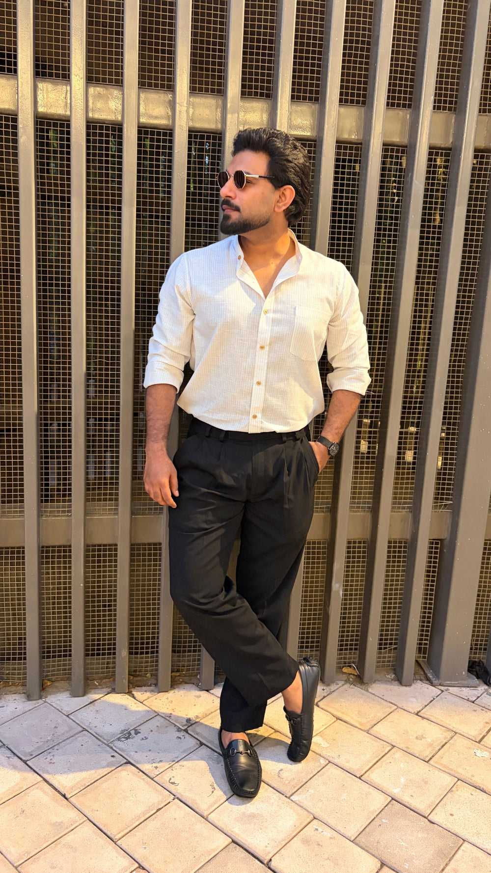 Shahnawaz Ahmed wearing the Dignity Blue Chalk Stripe Shirt