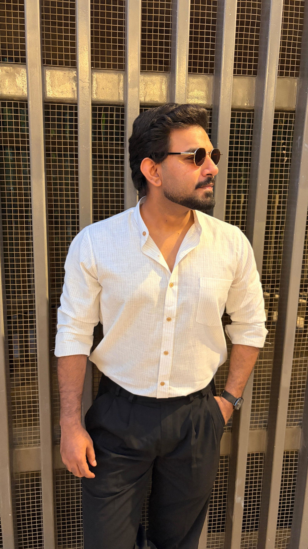 Shahnawaz Ahmed wearing the Dignity Blue Chalk Stripe Shirt