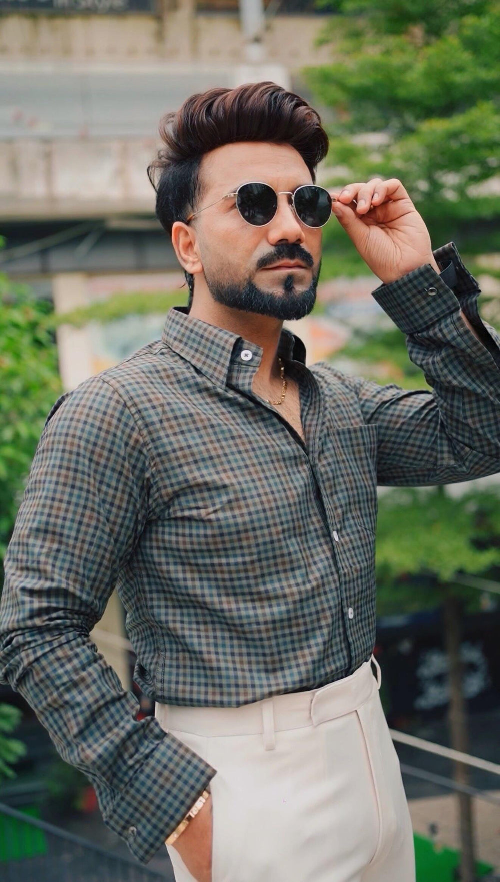 Ankit wearing the Dignity Green Micro-Check Shirt