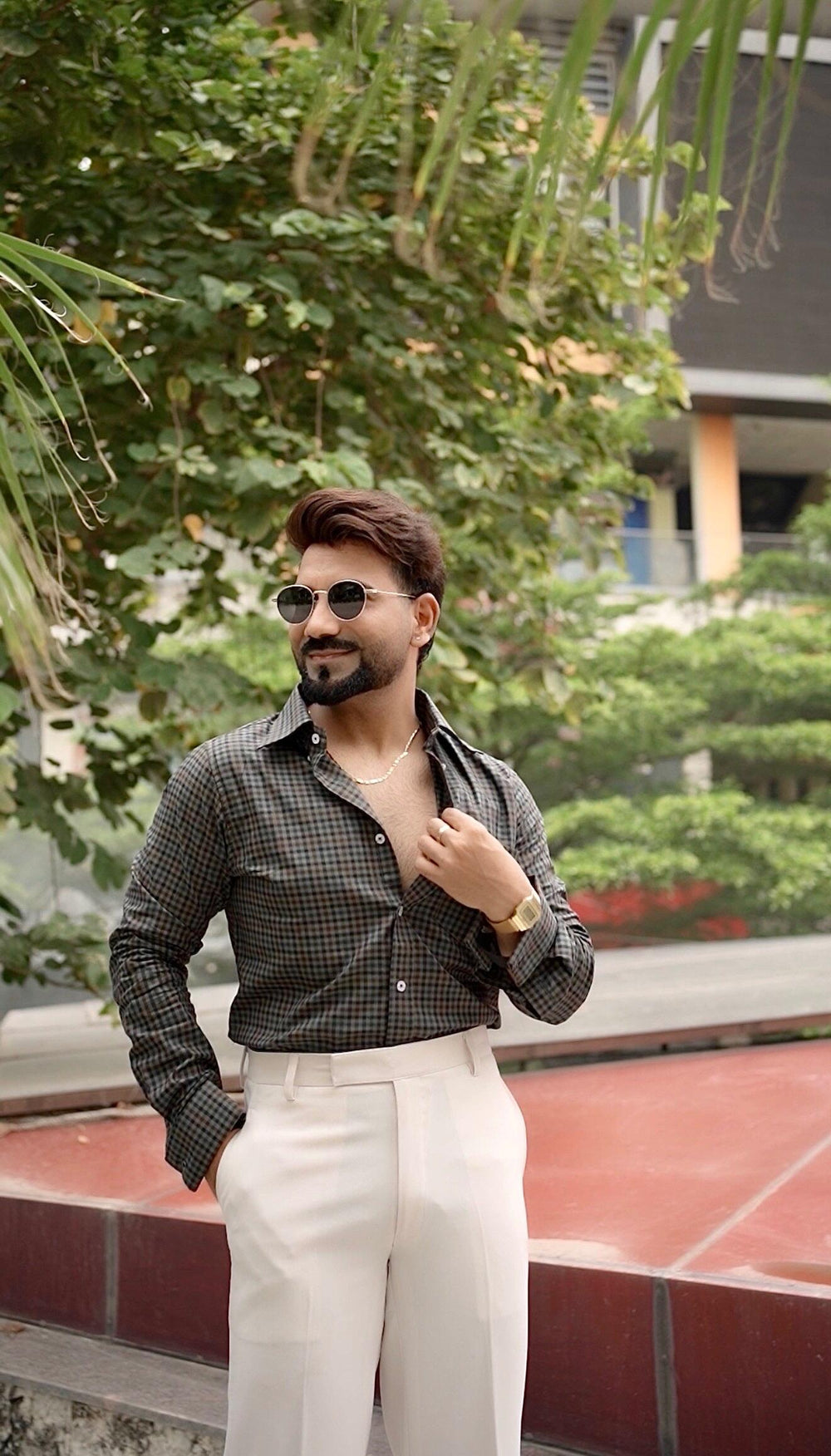 Ankit wearing the Dignity Green Micro-Check Shirt