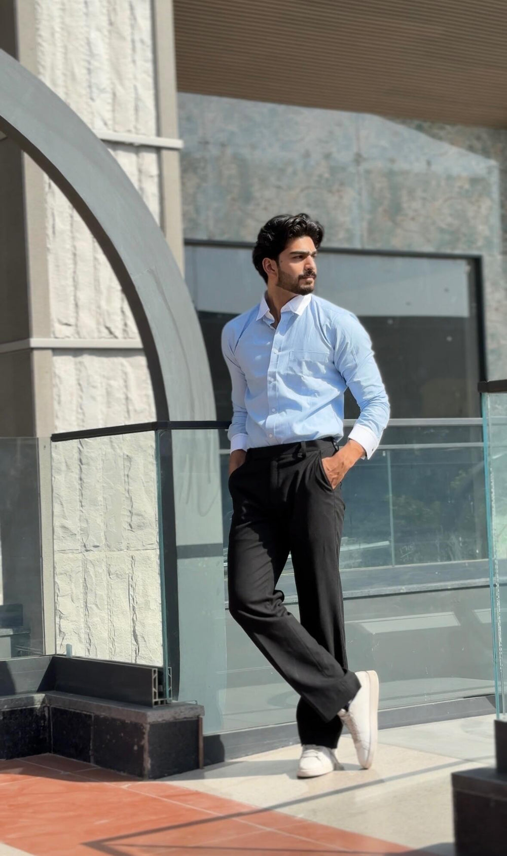Aabid Tantray wearing the Dignity Light Blue Oxford Shirt