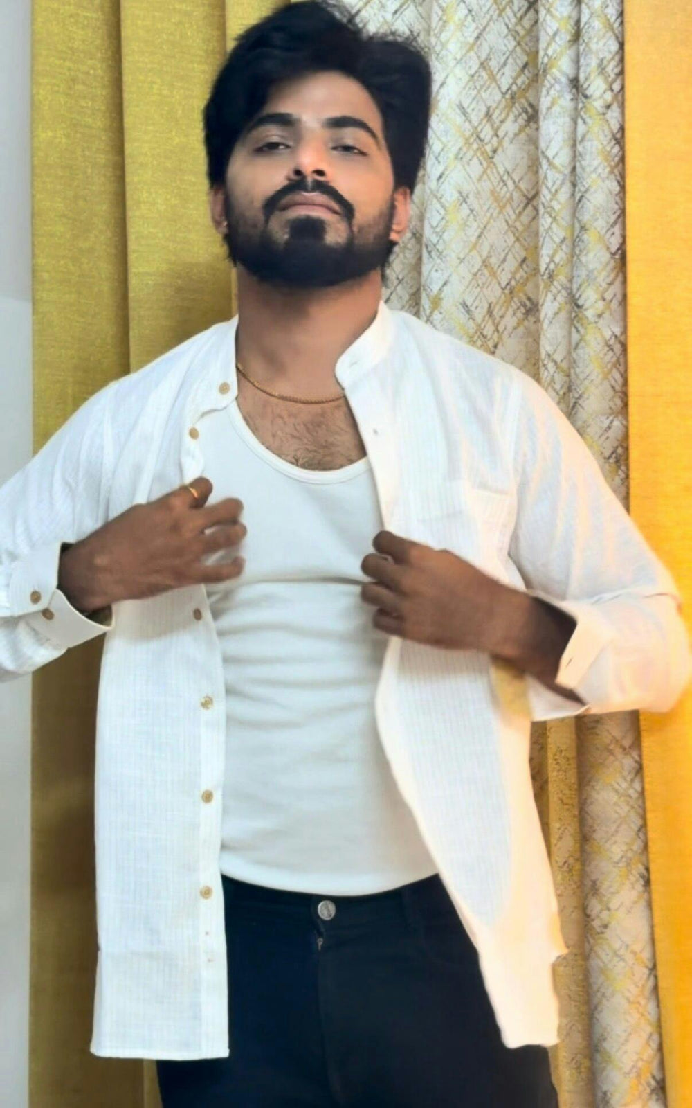 Shubz wearing the Dignity Off-White Pinstripe Shirt