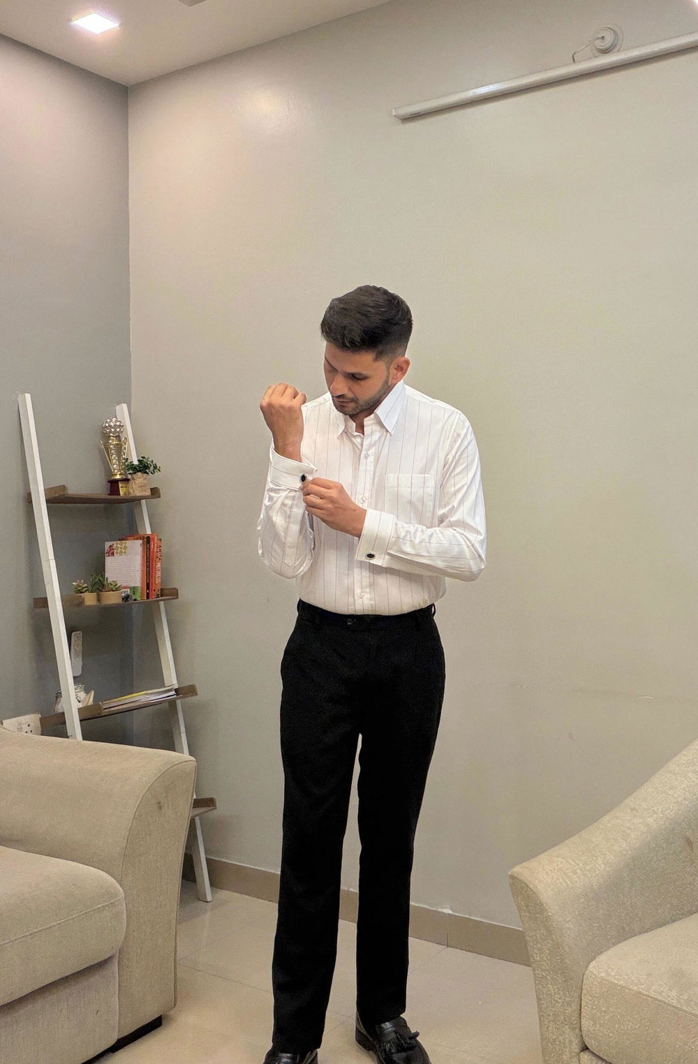 Abhinav wearing the Dignity Pink Giza Stripe Shirt