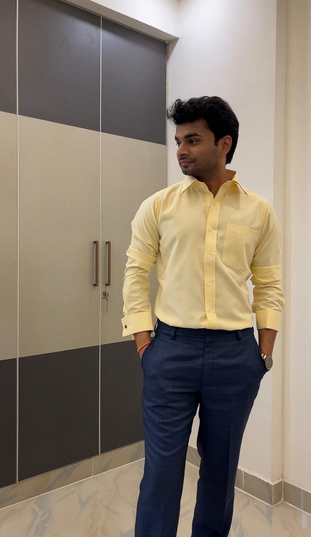 Anonymous wearing the Dignity Yellow Oxford Shirt