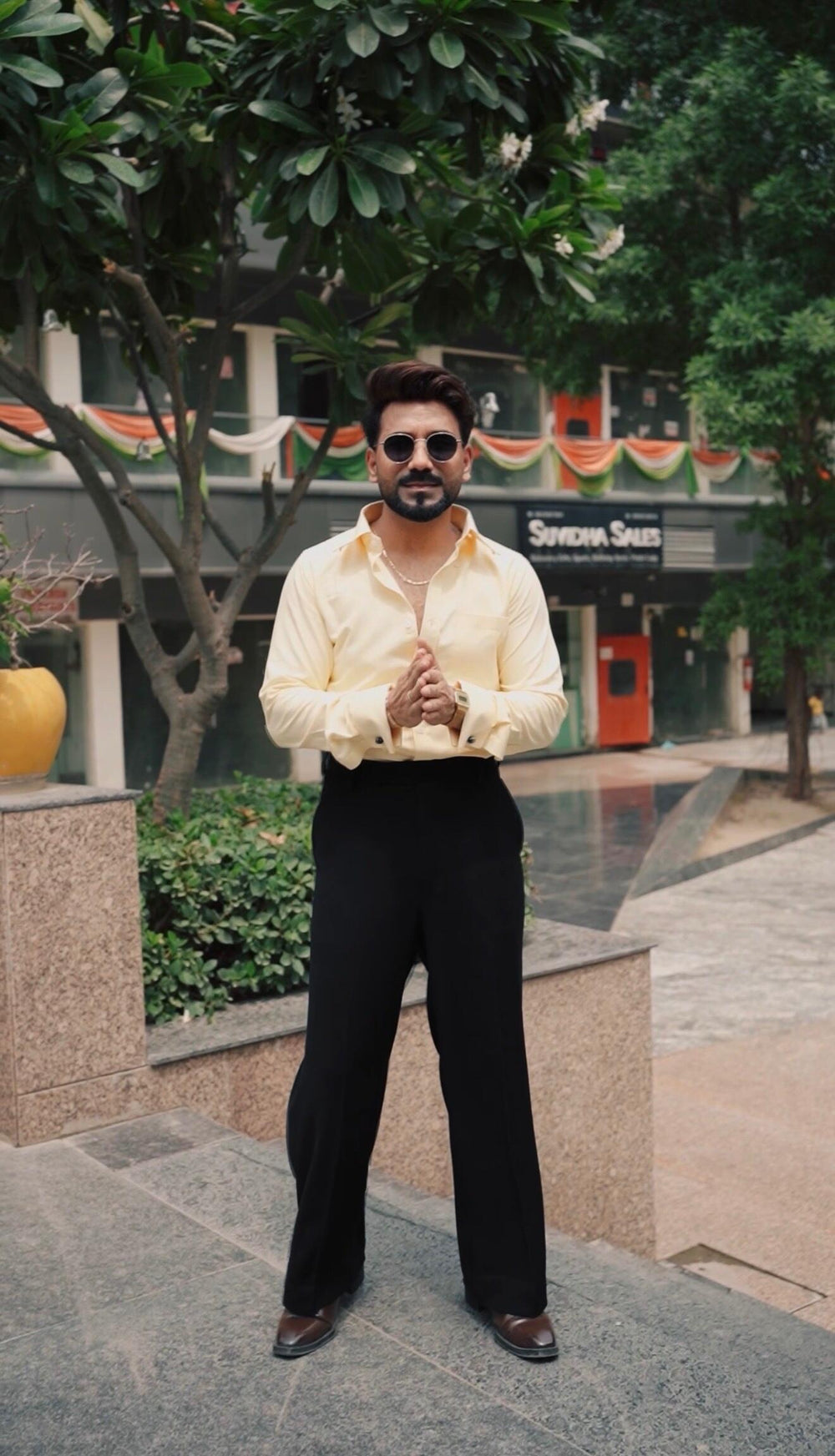 Ankit wearing the Dignity Yellow Oxford Shirt